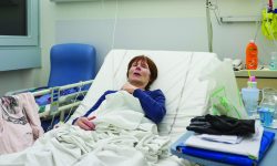 Mature woman in hospital bed DTD5CB Mature woman in hospital bed